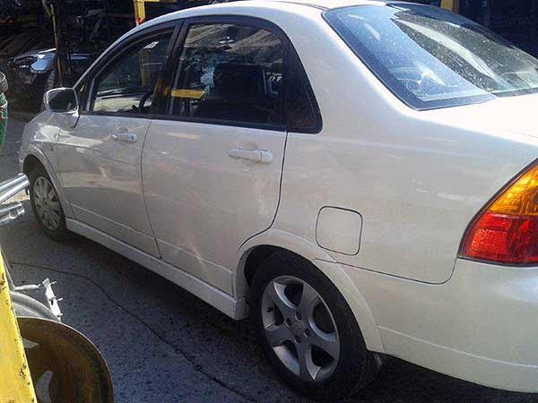 TAPA MALETA Suzuki AERIO 2003  USADO EN DESARME